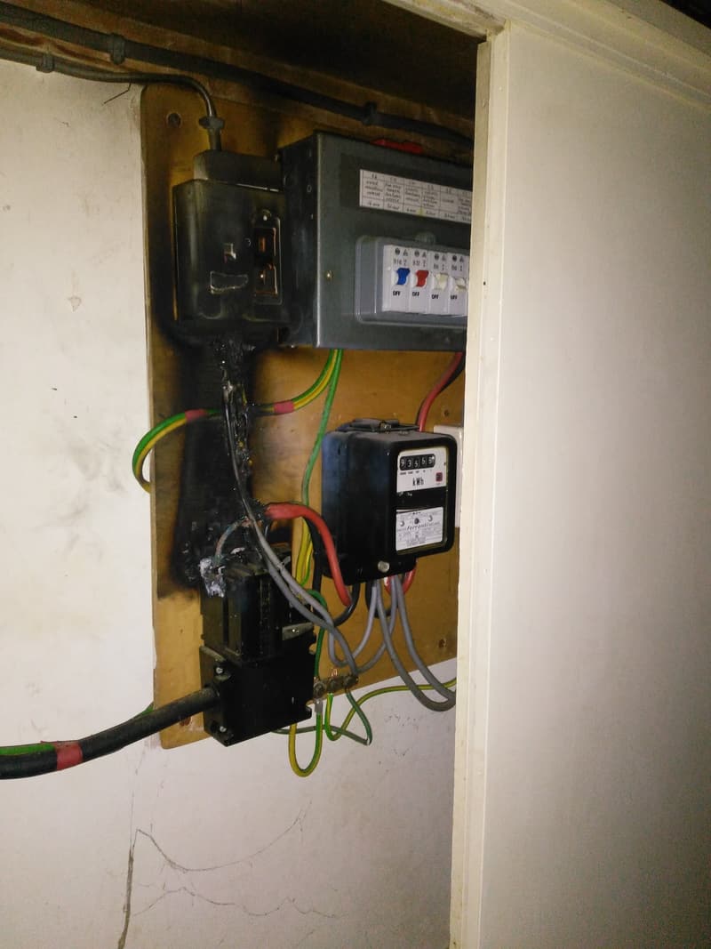 Heat damage at an old fuse box